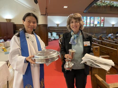 Claire and Julia with the communion elements