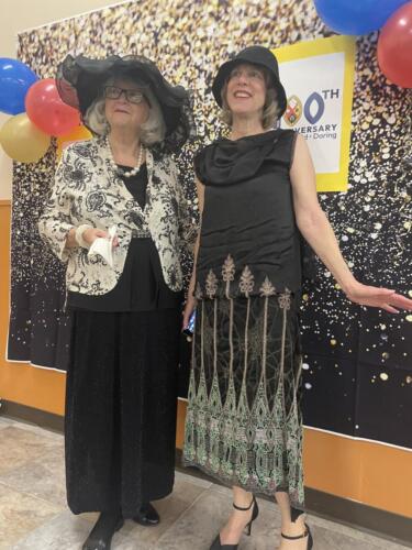 Laura and Claire in costume at 100th