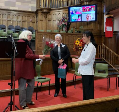 Julia Laura and Pauline - Julia receiving flowers from Central Church 
